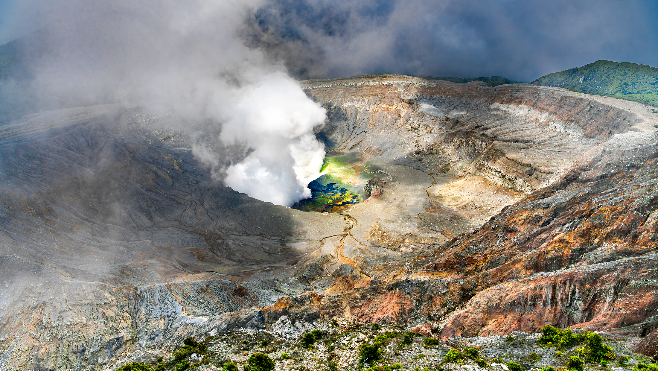 Active crater of Poás volcano with its acid lake, Costa Rica