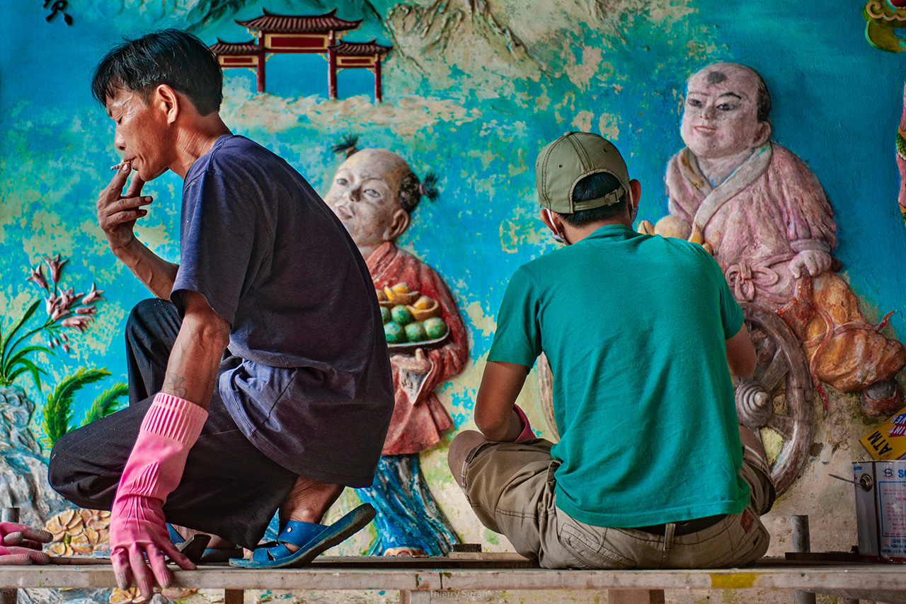Painters working in their studio in Hanoi, Vietnam.